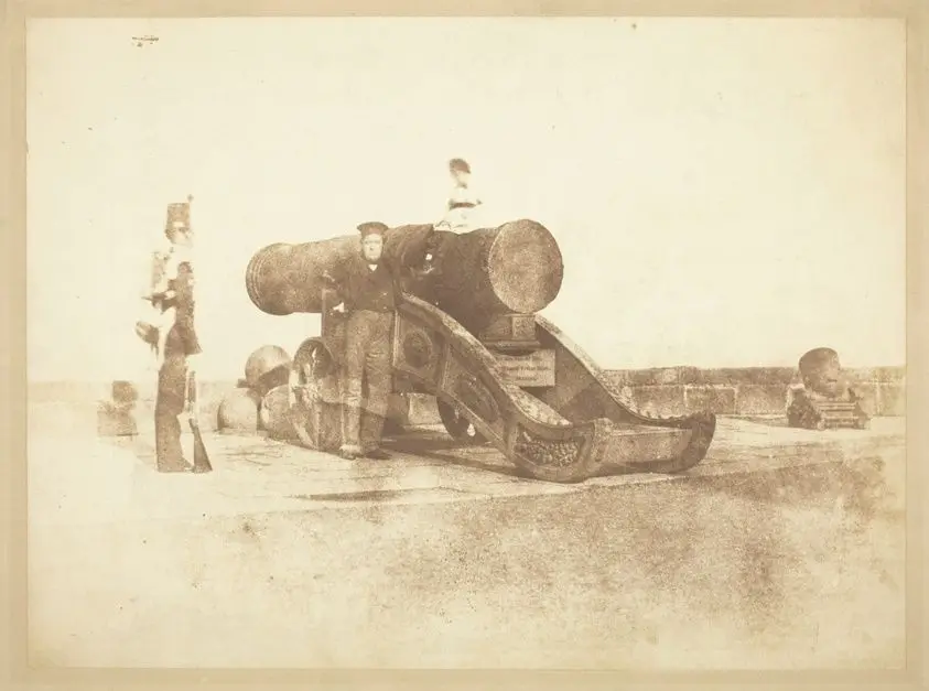 The cannon 'Mons Meg' at Edinburgh Castle, and a private in the 2nd battalion of Royal Scots who garrisoned the Castle in 1846 by David Octavius Hill (Scottish, 1802–1870) and