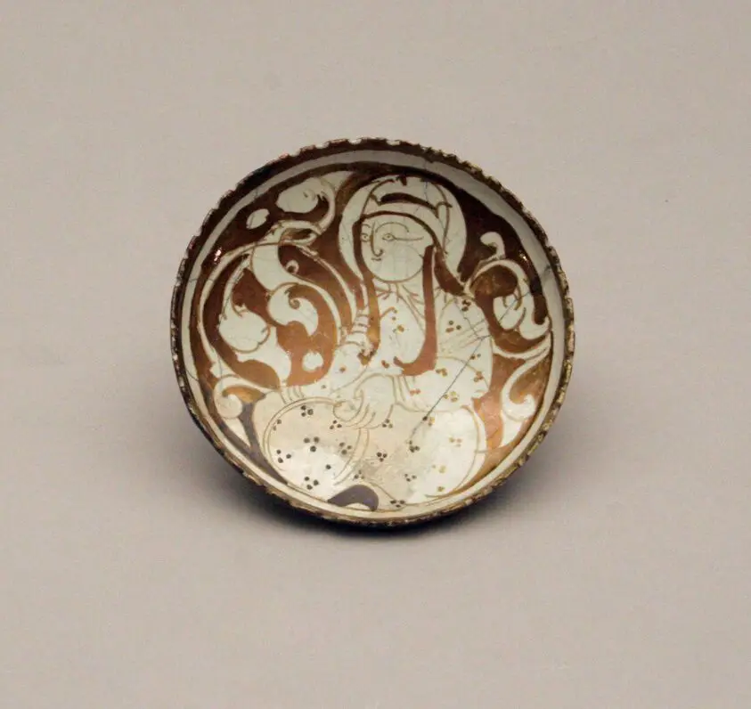 Dish with a Seated Figure by Iran