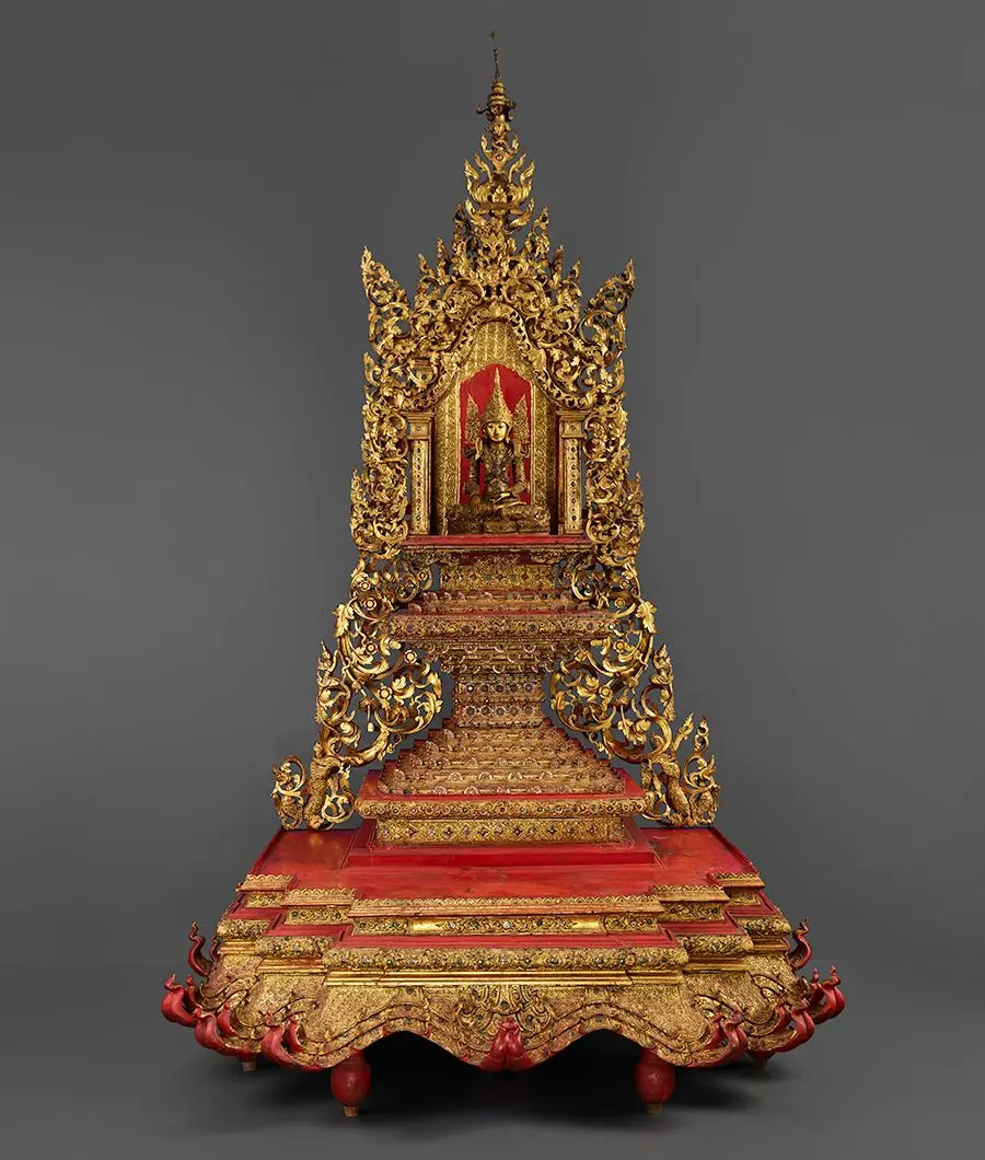 Crowned and bejeweled Buddha image and throne by Unknown artist