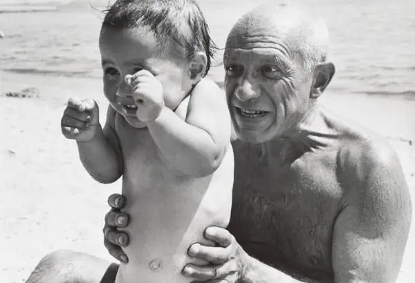 Picasso with His Son Claude by Robert Capa