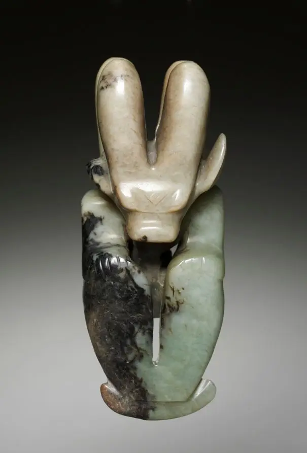 Amulet in the Form of a Seated Figure with Bovine Head by Unknown artist