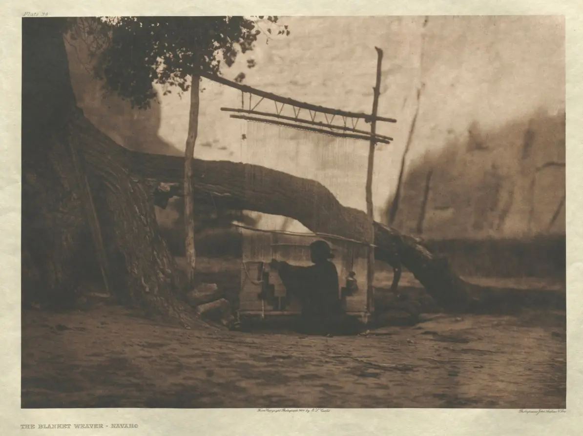 Portfolio I, Plate 34: The Blanket Weaver-Navaho by Edward S. Curtis