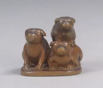 Wood Netsuke, Puppies by Unknown artist
