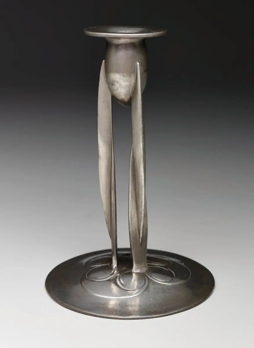 "Tudric" pewter candlestick by Archibald Knox