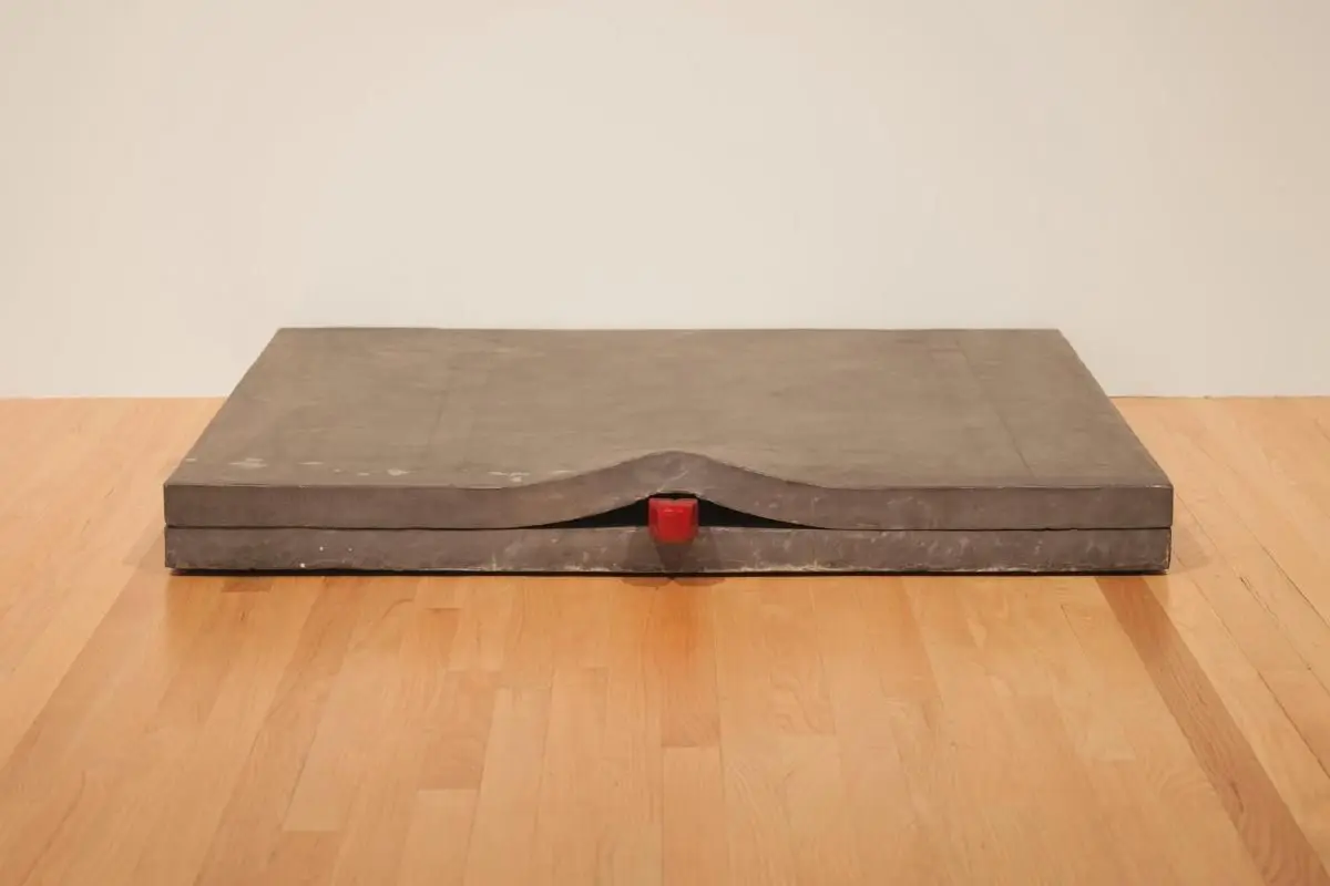 Untitled (Lead Piece with Wedge) by Bruce Nauman