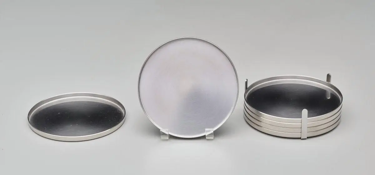 "Cylinda-Line" Barware Set of Six Coasters with Holder by Arne Jacobsen
