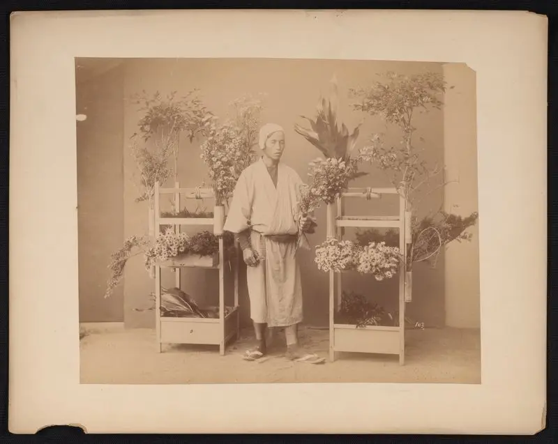 Selling flowers. by Unknown artist