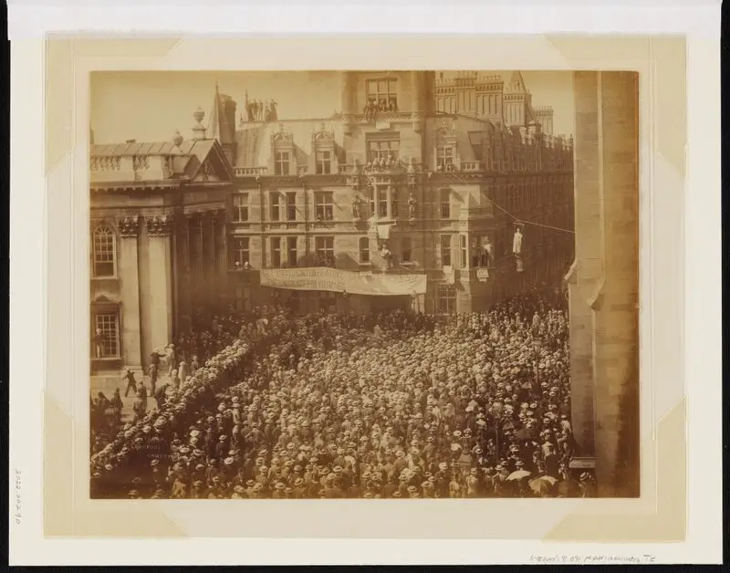 [University of Cambridge protest : effigy of a woman hung from Caius College across Trinity Street] / photographed by Thomas Stearn. by Stearn