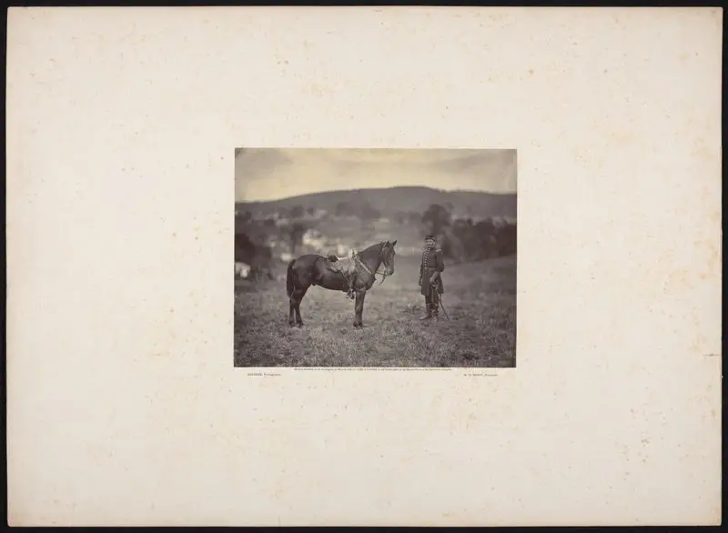 Officer beside horse by Gardner