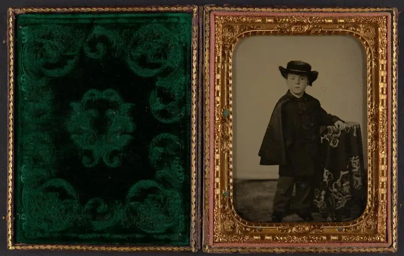 Standing portrait of an unknown boy. by Unknown artist