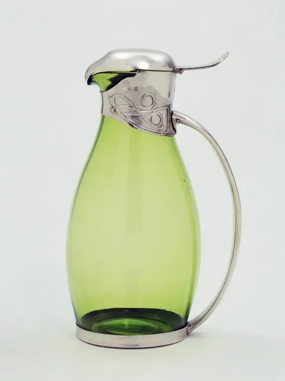 Glass with silver mounts, London hallmarks for 1903-4, mark of CYMRIC for Liberty and Co., probably designed by Archibald Knox. by Knox, Archibald