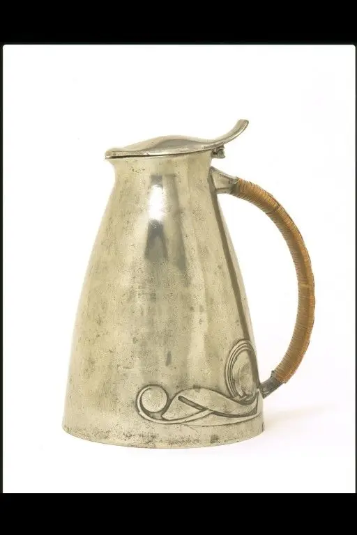 Pewter hot water jug, designer Archibald Knox, manufacturer W. H. Haseler, retailer Liberty & Co., 1904 by Knox, Archibald
