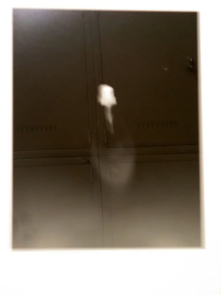 Spent Lightbulb Exposed by a Match by PARKER Cornelia