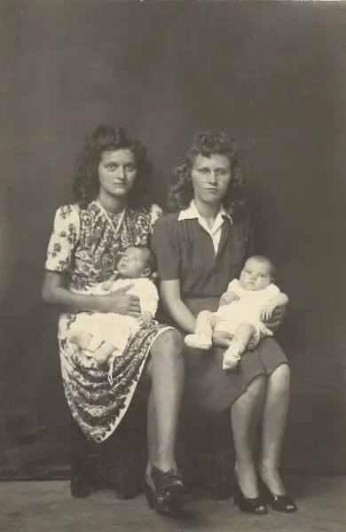 Untitled (two women, seated, each holding baby) by Mike Disfarmer