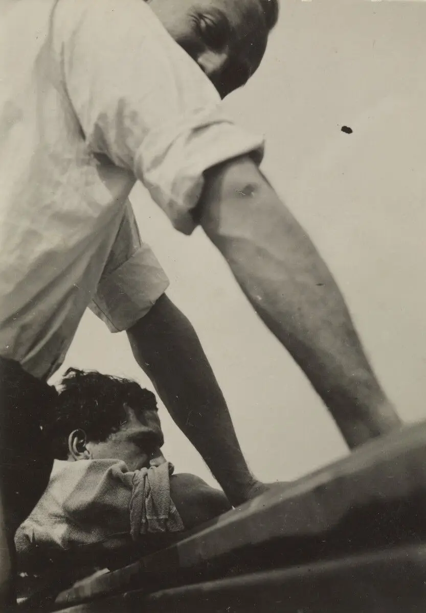 [View of two men from below, Bauhaus, Dessau]. by T. Lux Feininger