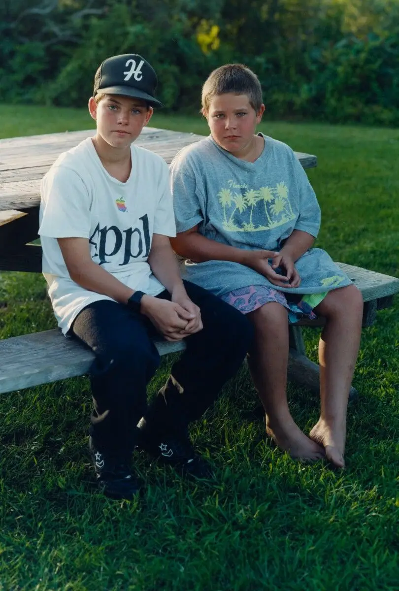 Untitled (Two Boys Sitting on a Bench) by Adam Bartos