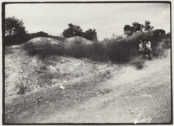 Elaine Mayes Photographing at Edge of the Earth by Bill Arnold