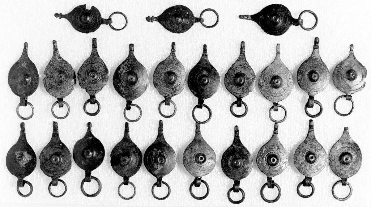 One Bronze Pendant on Ring by Unknown