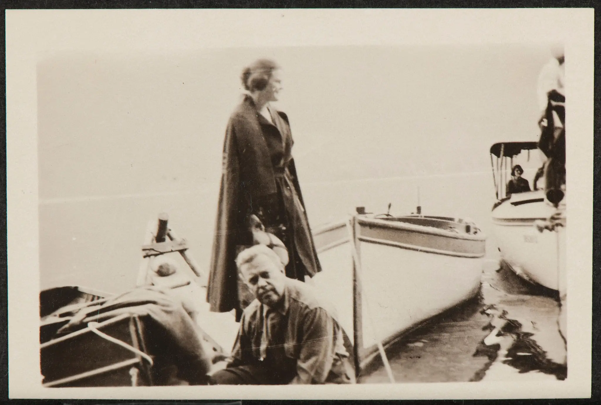 Couple Near Boats by American