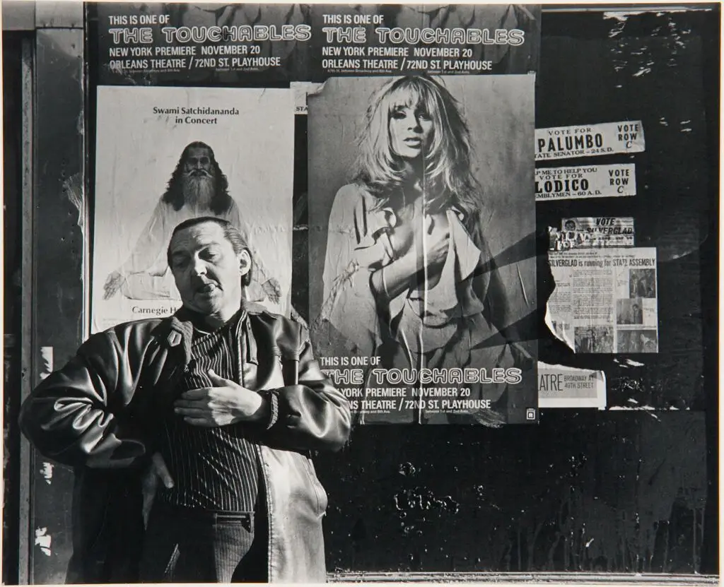 Untitled (man and movie poster) by David Campbell