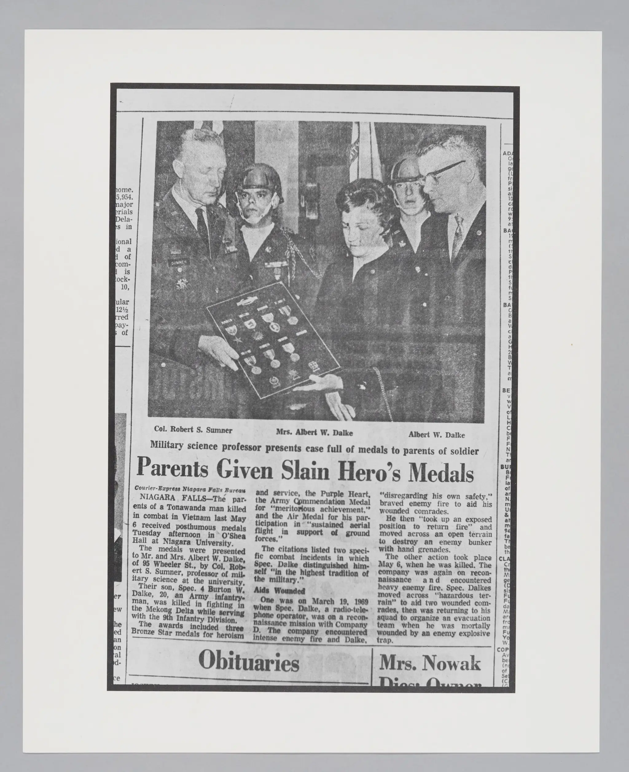 Untitled ("Parents Given Slain Hero's Medals") by Donald Blumberg