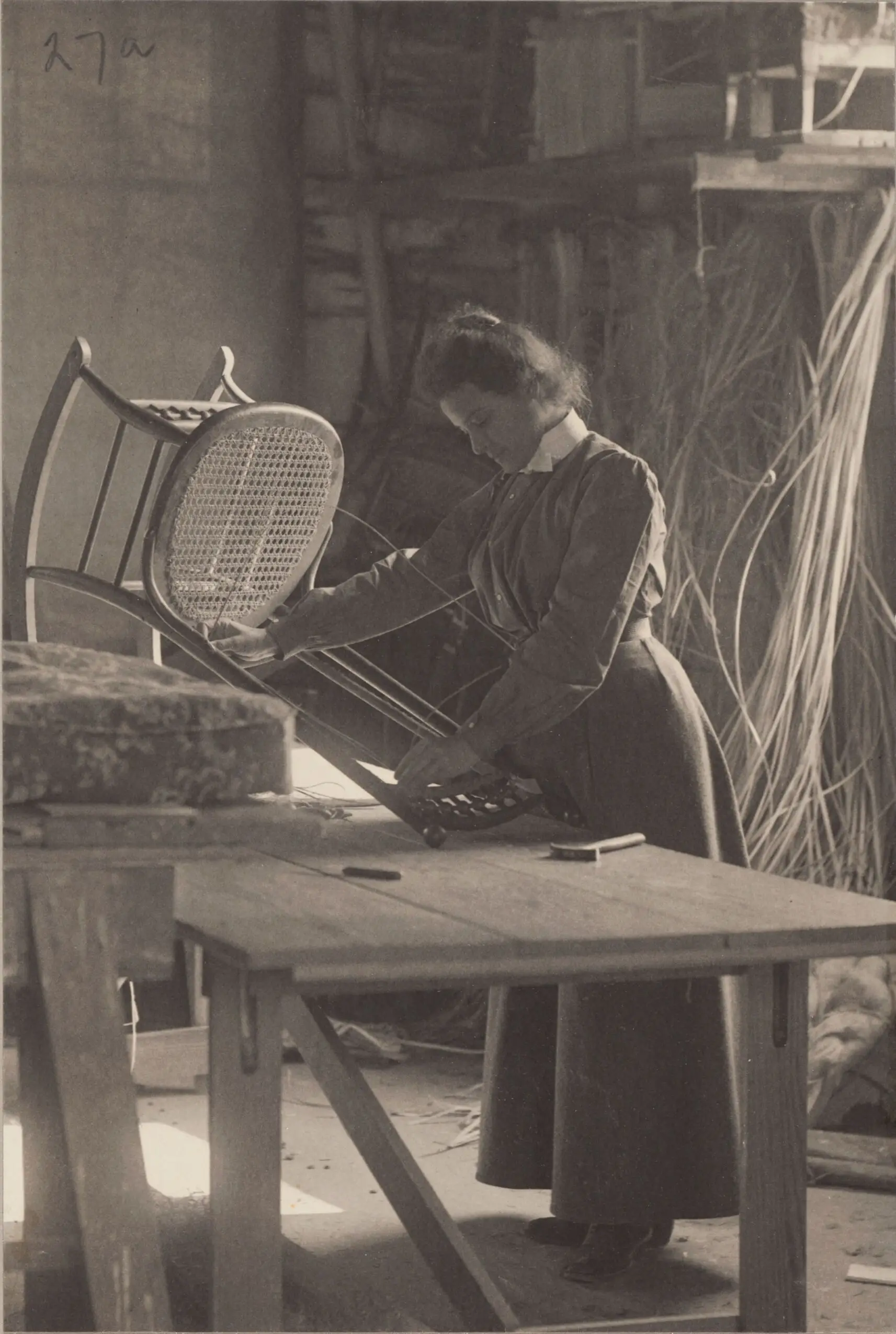 Races, Negroes: United States. Virginia. Hampton. Hampton Normal and Industrial School: Agencies Promoting Assimilation of the Negro. Training for Commercial and Industrial Employment. Hampton Normal and Agricultural Institute, Hampton, Va.: Chair Caning. by Frances Benjamin Johnston