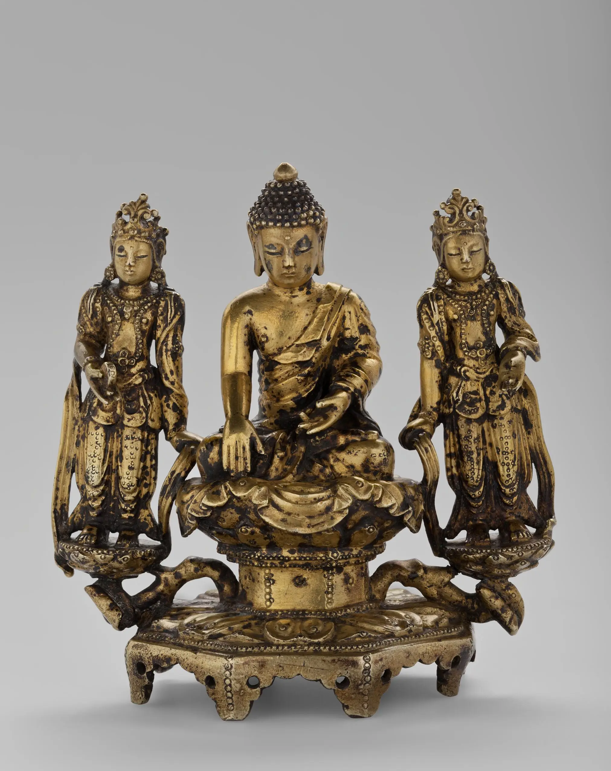 Buddhist Triad: Amitabha Buddha Seated on a Lotus Throne with His Hands Held in the 'Bhŭmisparsa-mudrâ' and Flanked by Two Standing Bodhisattvas, Presumably Avalokitesvara and Mahasthamaprapta by Unknown artist