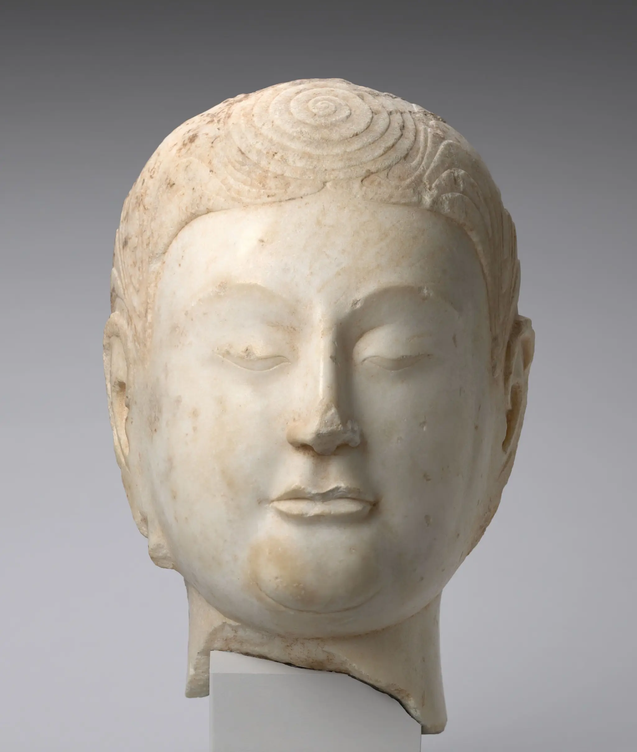 Head of a Buddha by Unknown artist