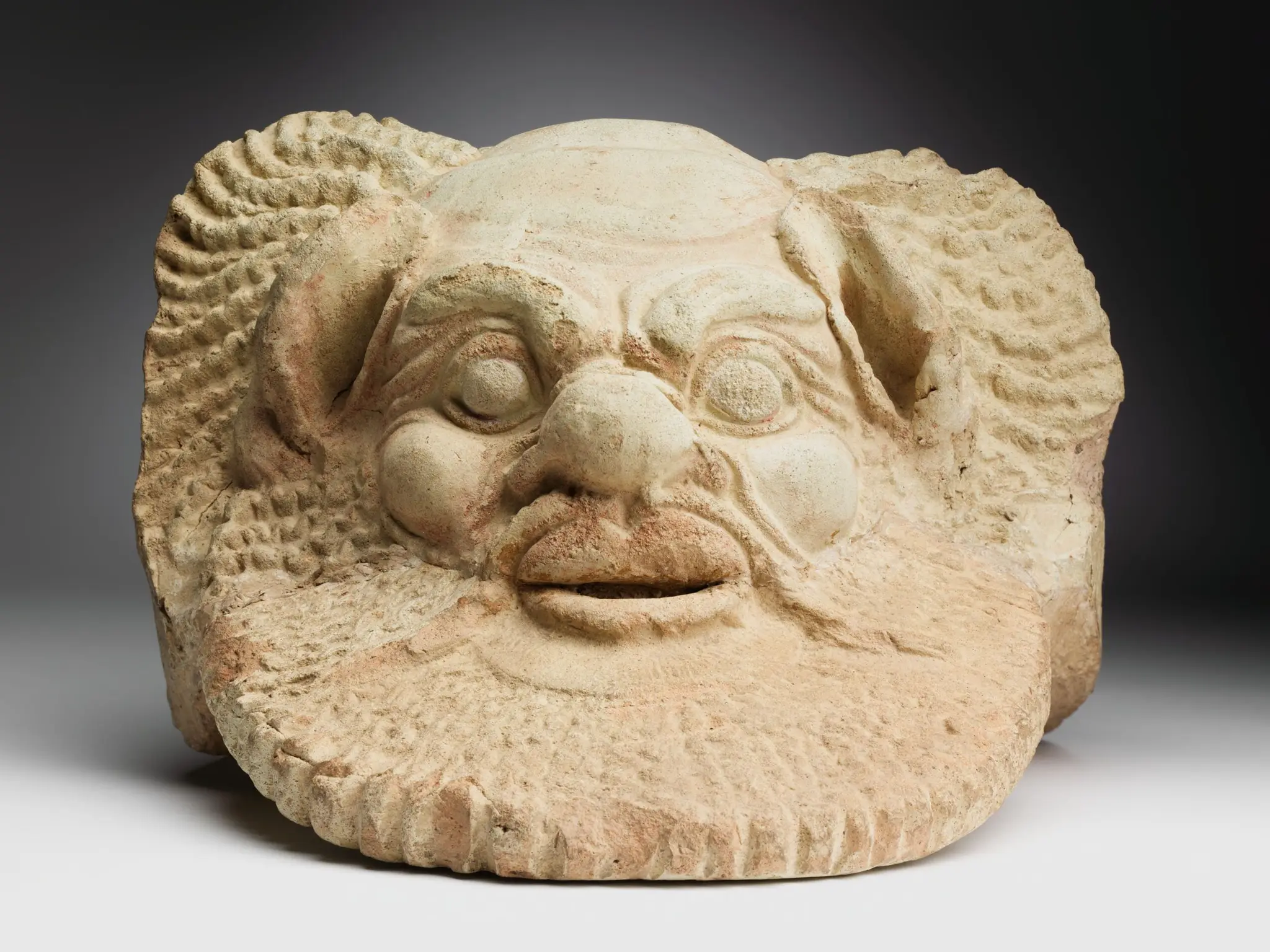Antefix in the Shape of a Mask of Silenos by Unknown artist