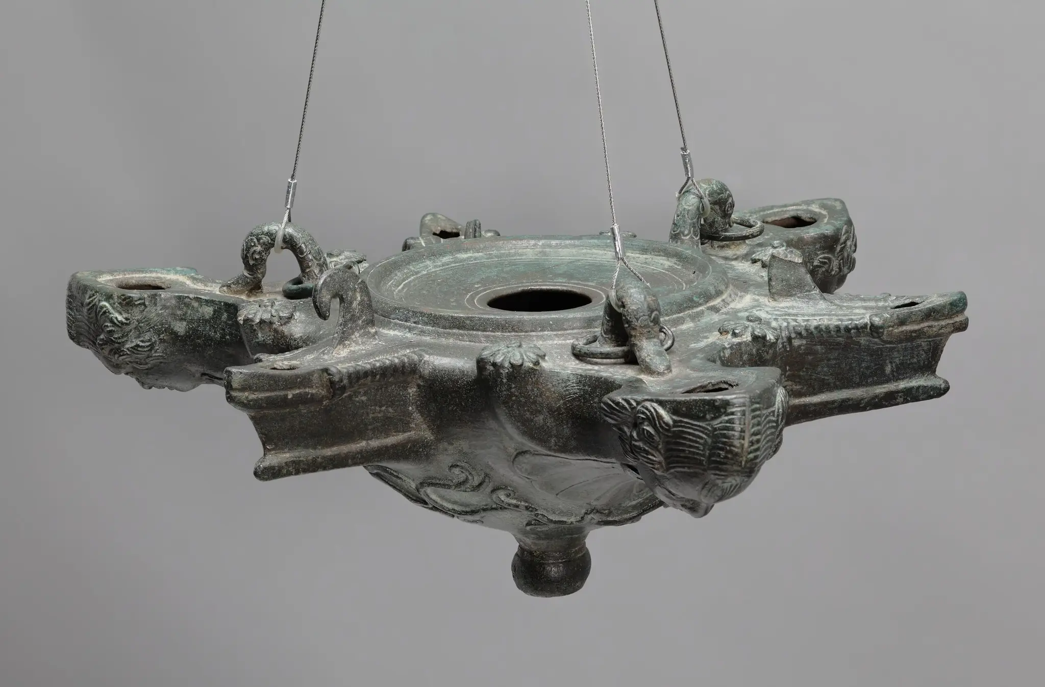 Oil Lamp with Nozzles in the Shape of Heads and Ships' Prows by Unknown artist