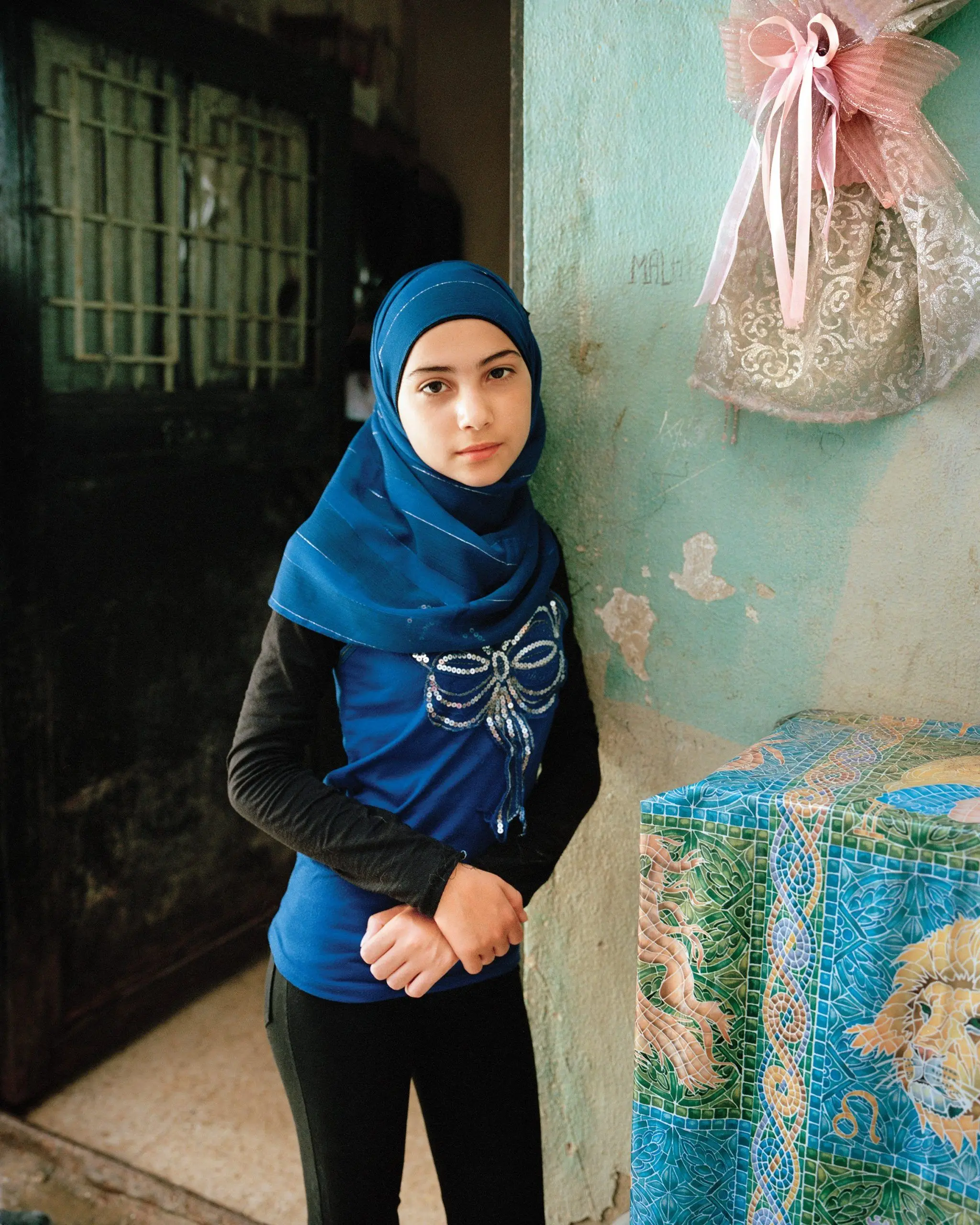 Samira at 13, Bourj El-Barajneh Refugee Camp, Beirut by Rania Matar