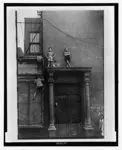 [Boys playing on lintel] by levitt, helen