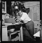 [Photographer Robert H. McNeill in the darkroom of Gem Photographers, operated by Larry Grymes and Robert McNeill, Washington, D.C.] by mcneill, robert h.