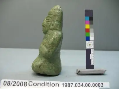 Full-round seated jade figure, CE 200-400 by kislak, jay i.