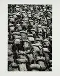 [Backs of workers climbing ladders in the open top mine at Serra Pelada, Brazil] by Salgado, Sebastião, 1944-2025, photographer by Salgado, Sebastião, 1944-2025, photographer