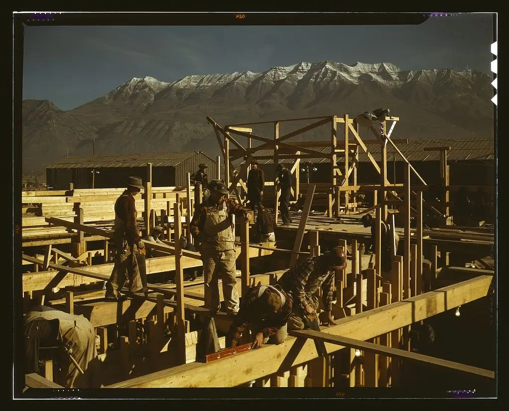 Constructing a building on the site of a new steel mill which will soon turn out steel for the war needs, Columbia Steel Co., Geneva, Utah by Feininger by Feininger