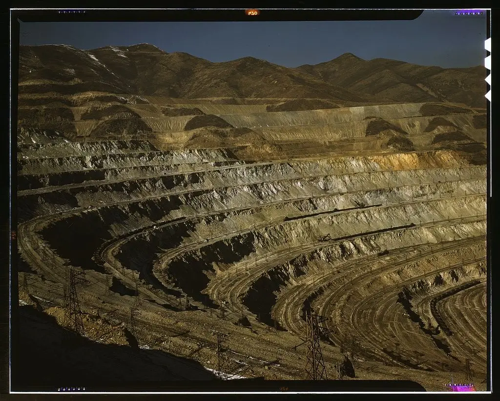 View of the Utah Copper Company open pit mine workings at Carr Fork, as seen from the railroad, Bingham Canyon, Utah by Feininger by Feininger