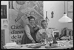 [Ray and Charles Eames behind desk at the Eames Office] by Office of Charles and Ray Eames. by Office of Charles and Ray Eames.