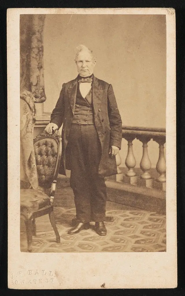 [Unidentified man, standing, with hand on chair] by Ball, James Presley, 1825-1904, photographer by Ball, James Presley, 1825-1904, photographer