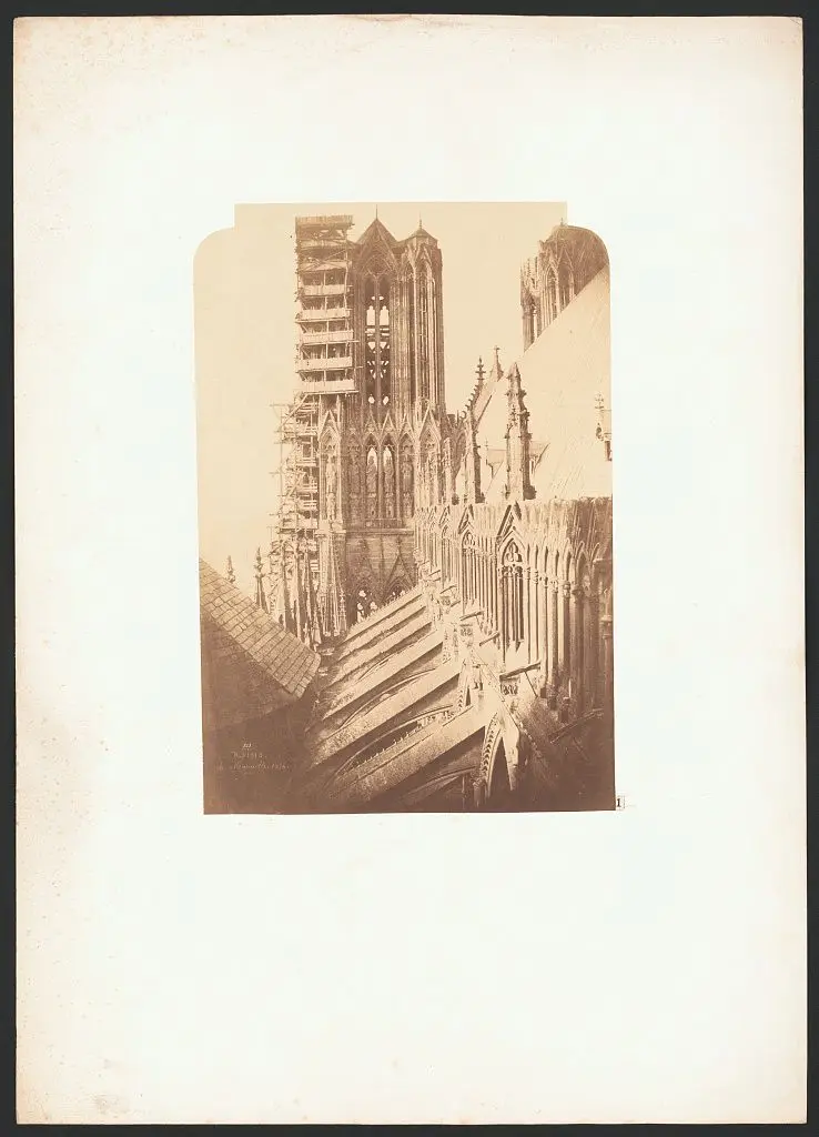 [Reims. Elevated view of West Tower, under restoration] by Marville by Marville