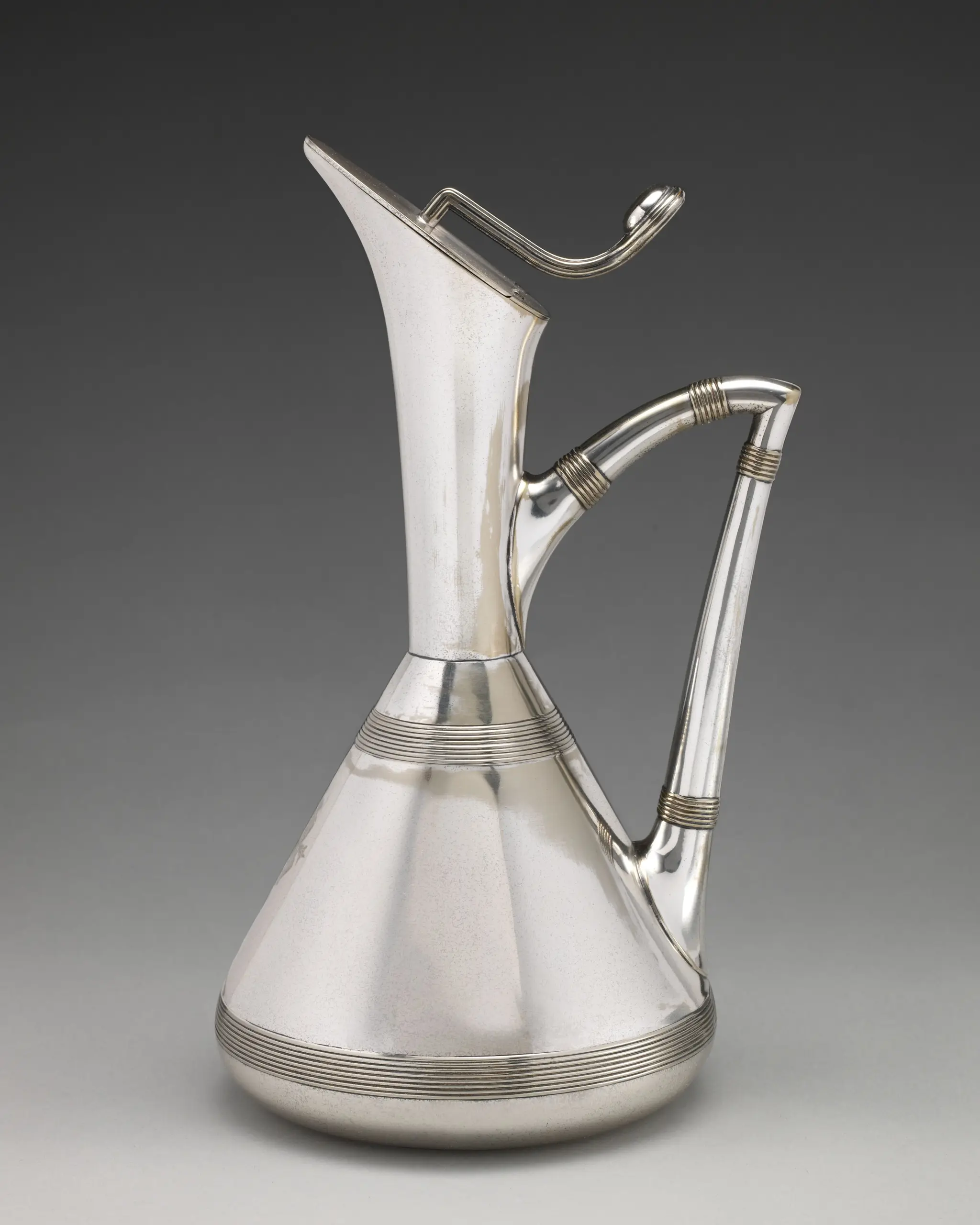 Lidded ewer by Christopher Dresser