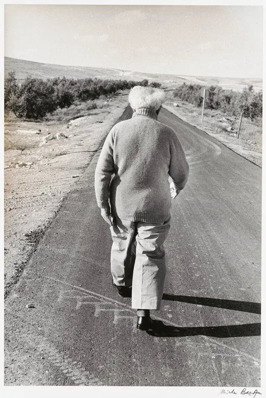 Mr. David Ben Gurion during his daily walk into part of the Negev Desert, near his new home, at the Kibbutz Sde Boker by Micha Bar-Am