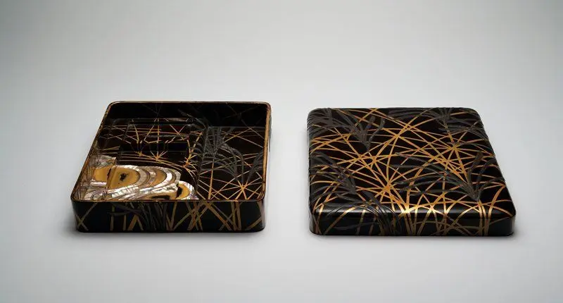 Lacquer writing box with design of autumn grasses and stream by Japan