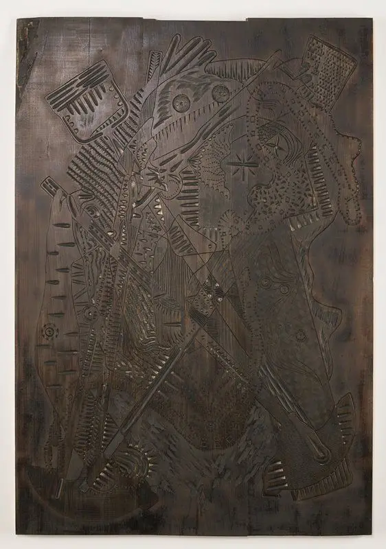 Printing matrix for the woodcut Hoarder by Aaron Spangler