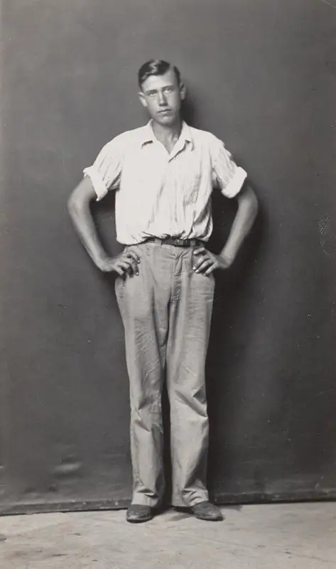 Standing man, arms akimbo by Mike Disfarmer