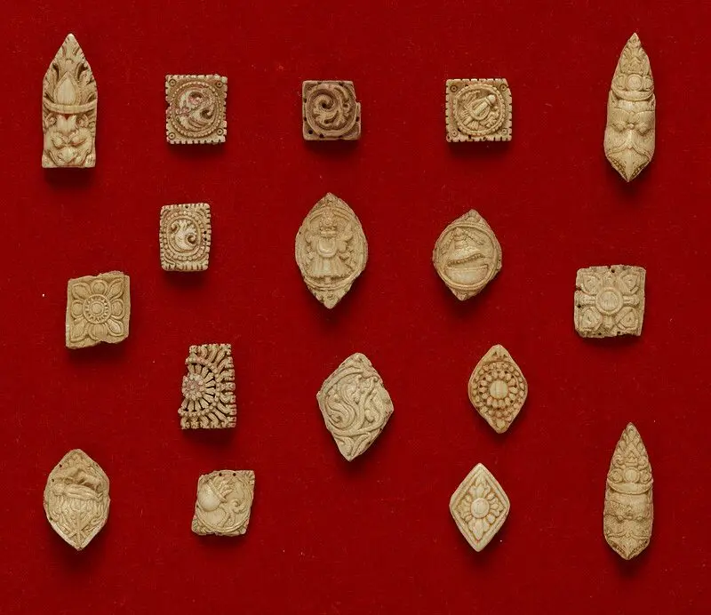 Group of 17 Tibetan bone apron ornaments by Tibet