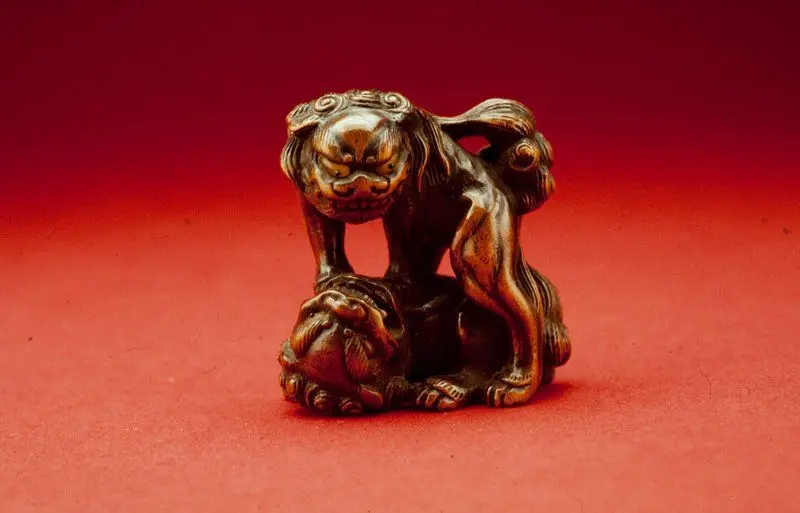 Two Chinese Lions Wrestling by Japan