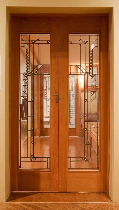 Door with stained glass window (left) from the Little House by Designer: Frank Lloyd Wright