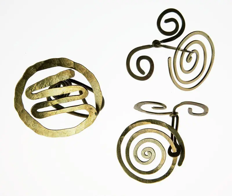 Tie clasp by Designer: Alexander Calder