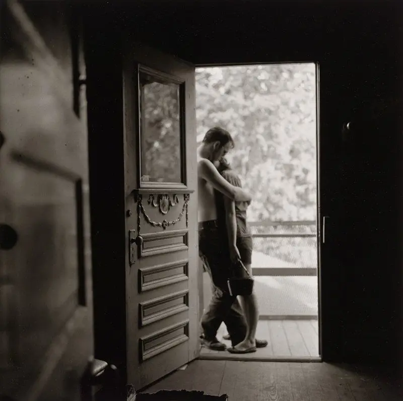 Lovers in a Doorway, Houston, Texas by Larry Fink